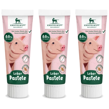 Drei Tuben Knuffelwuff Leberpaste für Haustiere, mit einer Schweineillustration, mit "88% Schwein" und "Leber Pasteete" deutlich angezeigt.