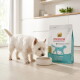 West Highland White Terrier blanc reniflant un bol à côté d'un sac de nourriture pour chiens hypoallergénique Select Gold Medica Veterinary Diet