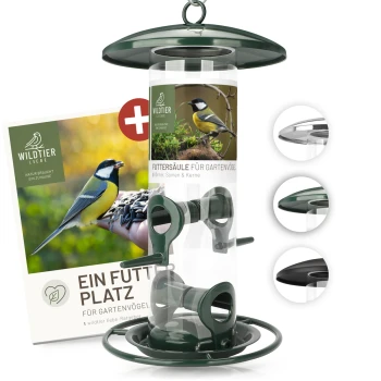 Grüner Vogelfutterspender mit einem klaren Rohr, beschriftet "Futtersäule für Gartenvögel" und einem Heftchen mit dem Titel "Ein Futter Platz."
