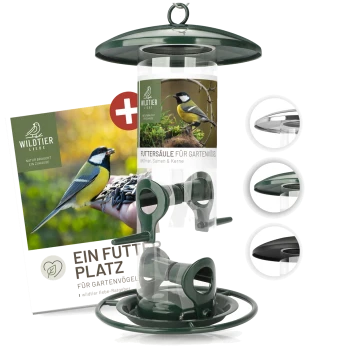 Grüner Vogelfutterspender mit einem klaren Rohr, beschriftet "Futtersäule für Gartenvögel" und einem Heftchen mit dem Titel "Ein Futter Platz."