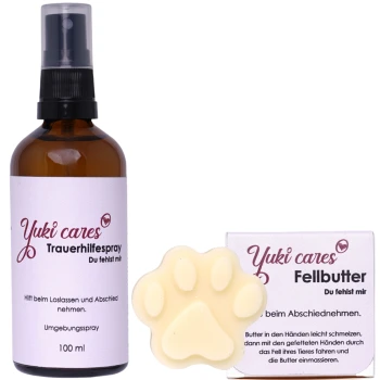 Yuki cares Trauerhilfespray (100 ml) in einer braunen Glasflasche und einer pfotenförmigen Fellbutter, beide für die Haustierpflege, mit deutschem Text.