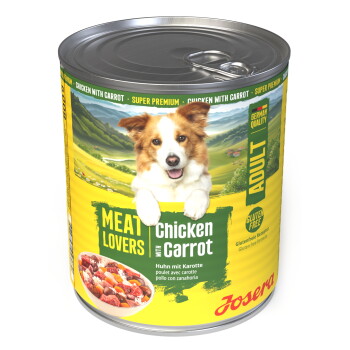 Dose Josera Hundefutter mit der Aufschrift 'Meat Lovers Chicken with Carrot' zeigt einen lächelnden Hund, 'Adult' und 'Gluten Free'.