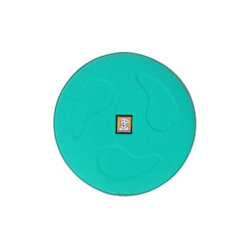 Runde türkisfarbene Haustiermatte mit strukturierten Pfotenabdruck-Designs und einem kleinen Ruffwear-Logo mit einer Hundegrafik in der Mitte.