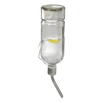 Klarer Glas-Wasserspender mit einer Messskala, gefüllt mit Wasser und einem gelben Schwimmer, der an einem Metallauslauf befestigt ist.