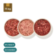 Rohfutterpakete für Haustiere mit Lamm-, Pferde- und Geflügelfleisch, mit Schalen von Hackfleisch, beschriftet mit '24 x Fleisch & Innereien' und '6 x Geflügel.'