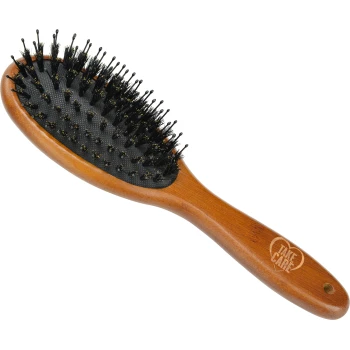 Brosse de toilettage pour animaux en bois avec un coussin de poils noirs, présentant des poils fins noirs et le texte "TAKE CARE" gravé sur le manche.