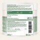 Weiß-grünes Etikett einer 250-g-Dose für Ergänzungsfutter für Hunde mit Zutaten, Fütterungsempfehlungen und Barcode.