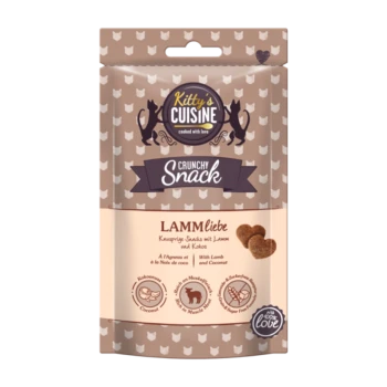 Emballage pour "Kitty's Cuisine Crunchy Snack" contenant de l'agneau et de la noix de coco, étiqueté "LAMMliebe" avec un design marron et crème.