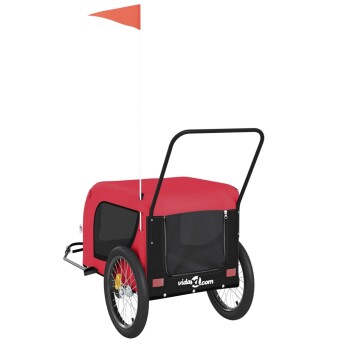 Roter Haustieranhänger mit schwarzen Akzenten, zwei Rädern und einer Fahne, mit Netzfenstern und einem Griff für einfaches Ziehen.