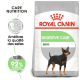 Sac de nourriture pour chien Royal Canin Digestive Care Mini avec un chien noir et feu, avec un texte mettant en avant l'amélioration de la qualité des selles et des résultats prouvés.