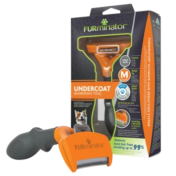 Outil anti-mue FURminator orange pour sous-poil et emballage indiquant «UNDERCOAT deSHEDDING TOOL», taille M