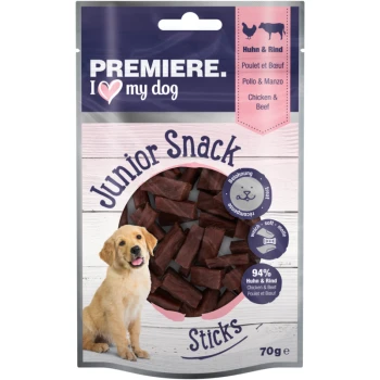 Verpakking van hondensnoepjes gelabeld "Junior Snack Sticks," 70g, met een gouden retriever puppy en "Premiere. Ik hou van mijn hond" branding.