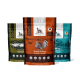 Drei Tüten von deutschem Shephy Hundefutter: Sensitives Lamm & Reis, Truthahn & Kartoffel und Lachs, jede mit einzigartigen Farben und "Getreidefreies Rezept."
