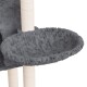 Grau plüschige Katzenliege, die an einem Holzpfosten befestigt ist, mit einem weichen, runden Schlafbereich mit einem gewellten Rand.