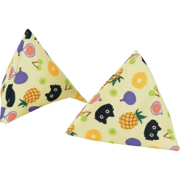 Two yellow triangular fabric catnip toys patterned with pineapples, figs, cherries, orange slices and black cat faces.