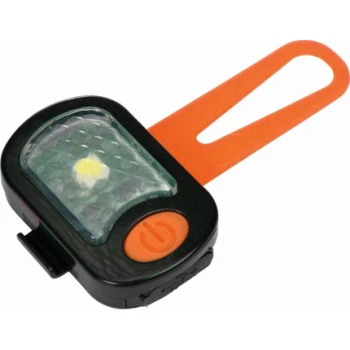 Ein kleines schwarzes und orangefarbenes LED-Haustiersicherheitslicht mit einem diamantmusternden Objektiv und einem orangefarbenen Riemen zur Befestigung.