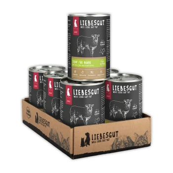 Tray mit sechs LIEBESGUT-Dosen, schwarze Etiketten mit Schafillustration und Text 'LIEBESGUT' und 'Schaf für Hunde'.