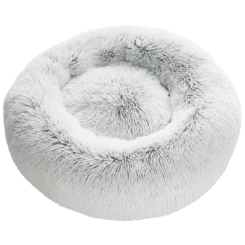 Fluffy runder Haustierbett aus weichem weißen Fell, mit einem erhöhten Rand und einem gemütlichen Zentrum, in dem Haustiere bequem ruhen können.