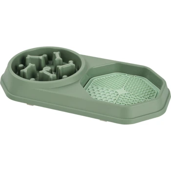 Grüne Plastik-Napf für langsames Fressen mit Labyrinth-Design auf einer Seite und strukturierter Matte auf der anderen Seite.