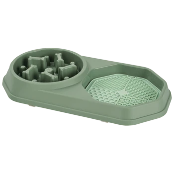 Grüne Plastik-Napf für langsames Fressen mit Labyrinth-Design auf einer Seite und strukturierter Matte auf der anderen Seite.