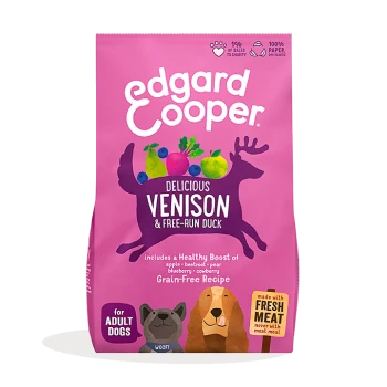 Edgard Cooper dog food bag featuring "Delicious Venison & Free-Run Duck" with illustrations of fruits and a deer, labeled grain-free recipe.