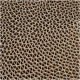 Close-up of a textured, honeycomb-patterned cardboard surface, likely used for pet scratching or play.