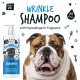 Bulldogge mit einem glücklichen Ausdruck neben einer Flasche 'Bugalugs Wrinkle Shampoo', das hypoallergenen Duft und pH-ausgewogen enthält.