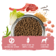 Schüssel mit Trockenhundefutter umgeben von Lammfleisch, Gemüse, Getreide und Symbolen, die glutenfrei, Gelenkunterstützung und Vitalitätsvorteile hervorheben.