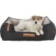 Ein gemütliches dunkelgraues Hundebett mit beigem Innenraum und Ledergriff, mit einem kleinen weißen Hund, der darin entspannt.