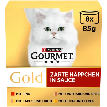 Schachtel Purina Gourmet Gold Katzenfutter mit Bild einer weißen Katze, 8 Dosen à 85g, Geschmacksrichtungen auf Deutsch aufgeführt.