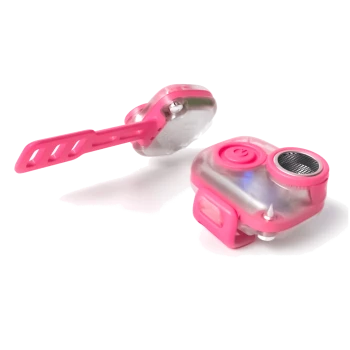 Pinkfarbener Haustier-Trainingsklicker mit Handgelenkschlaufe und Knopf vor weißem Hintergrund.