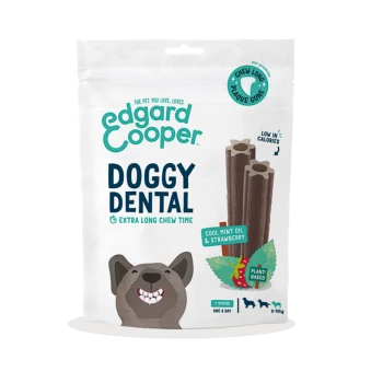 Edgard Cooper Doggy Dental treats package with a smiling dog, labeled "Extra Long Chew Time," featuring mint & strawberry flavors.
