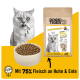 DOGS'n TIGER Katzenfuttertüte mit der Aufschrift 'Leckeres Huhn & Ente mit Gemüse' und '75 %', mit einer sabbernden Katzenillustration und einer Schale Trockenfutter.
