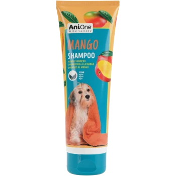 Tube de shampooing AniOne à la mangue, visuels de mangue, inscription « MANGO SHAMPOO », icône vegan et chien enveloppé dans une serviette orange.