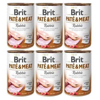 Sześć puszek Brit Pâté & Meat dla kotów, oznaczonych "Królik", z całymi kawałkami organów i mięsa, z ikonami "Bez zbóż" i "Bez soi i GMO".