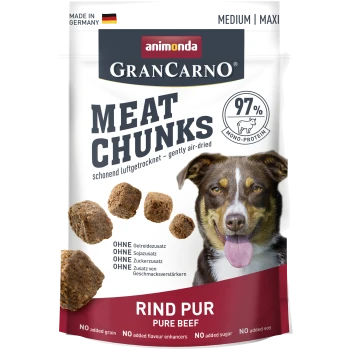 Paket von GranCarno Fleischstücken für Hunde mit einem lächelnden Hund, mit Text, der 97% Mono-Protein, reines Rindfleisch und keine zugesetzten Körner oder Zucker hervorhebt.