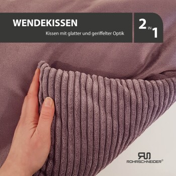 Wendekissen in lila, mit glatter und geriffelter Optik, gehalten von einer Hand; Text: "2 in 1" und "Rohrschneider".