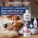 Ein Hund auf einem Teppich wird gestreichelt, mit Pawlie's Sensitive Shampoo und Juckreiz Spray, das "Hautpflege+" und "Hautpflege-Set" bewirbt.