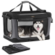 Grau/schwarze, weiche Hundebox mit Netzfenstern und Griffen, Husky liegt innen, gefaltete Tasche darunter, 'feandrea'-Label sichtbar