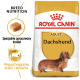 Torba z karmą dla psów Royal Canin Adult Dachshund z ilustracją jamnika, z tekstem o żywieniu rasy i wsparciu stawów.