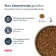 Hundefutter in einer Schüssel mit Kibble, mit Text über natürliche Immununterstützung, getreidefreies Rezept und Eignung für aktive erwachsene Hunde.