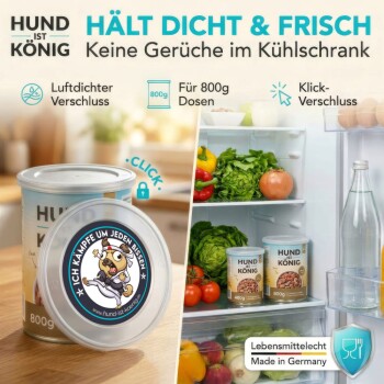 Eine Hand hebt den Deckel von einer Metalldose mit Haustierfutter, mit dem Text 'LEICHT AUFZUSETZEN UND ZU ENTFERNEN' darüber.