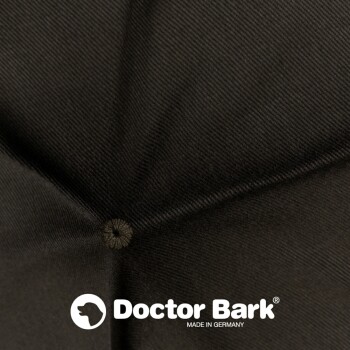 Ein dunkelbraunes "Doctor Bark" Hundebett, waschbar bis 95°C und trocknergeeignet, mit Maschinenwaschanweisungen.