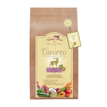 Braune Papiertüte mit Terra Canis Hundefutter, beschriftet mit 'Canireo', mit einem Wildspiel-Thema, das Illustrationen von Gemüse und Früchten zeigt.