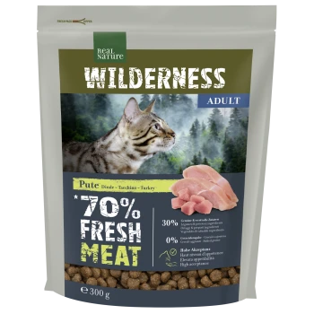 Emballage de nourriture pour chat avec un chat Bengal, étiqueté "Wilderness Adult," avec 70% de viande fraîche, de la dinde et des détails nutritionnels.
