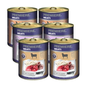 Sechs Dosen PREMIERE MEATI Haustierfutter, mit Geschmacksrichtungen wie Hühnerherzen, Kalbfleisch und Lamm, mit Bildern von Fleisch auf den Etiketten.