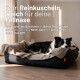 Schwarz-weißer Hund schläft in grauem Bett mit beigem Fleece; deutscher Text: 'Zum Reinkuscheln weich für deine Fellnase.'
