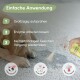 Eine Hand hält eine Sprühflasche mit der Aufschrift "Caruchs" und sprüht einen Teppich in der Nähe eines schlafenden Welpen. Textanweisungen auf Deutsch erläutern die Anwendungsschritte.