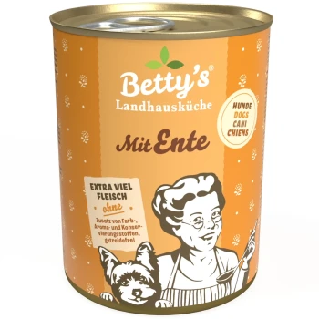Ente 6x400 g Dose Hundefutter "Betty's Landhausküche Mit Ente" mit Koch und Hund; hebt "extra viel Fleisch" und "ohne Farb- und Konservierungsstoffen" hervor.