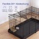Schwarzer Draht-Auslauf für Haustiere auf einer Wanne mit Heufutterspender und Napf, darunter der Text 'Flexible DIY‑Abdeckung' und deutsche Symbolbezeichnungen.